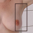 Check the outer half of your breast and up into the arm pit